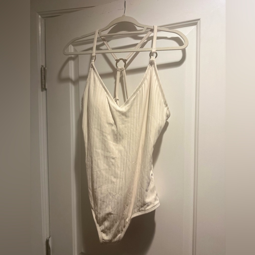 Cream, padded one-piece swimsuit with gold hardware, strappy back ✨